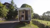 Couple pack it all in and move into their new mobile home – an old white van